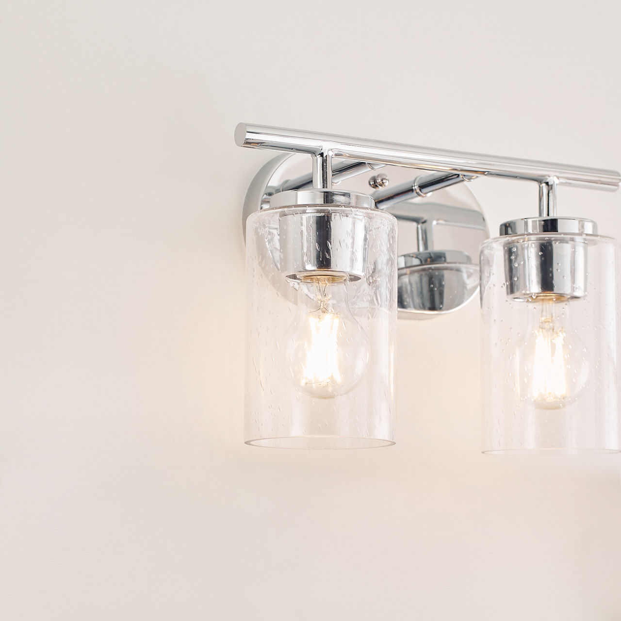 Oslo 2-Light Bath Sconce in Chrome with Clear Seeded Glass Bulbs Not Included