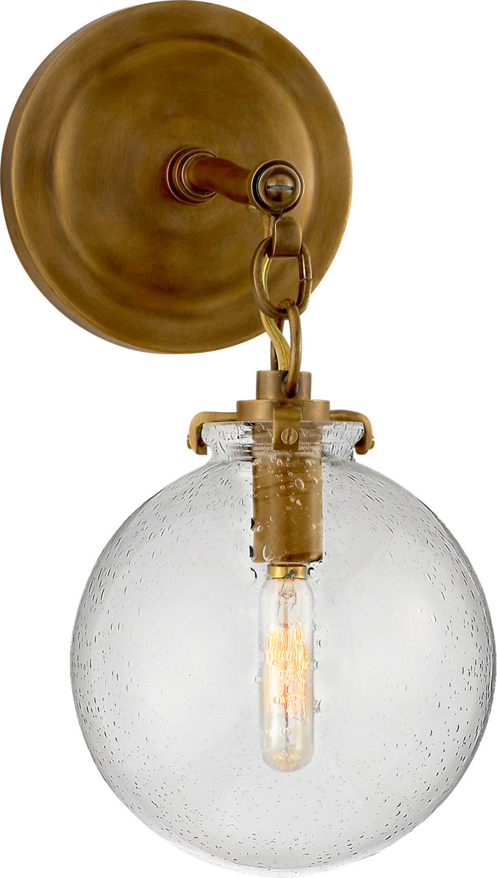 Katie Small Globe Sconce in Hand-Rubbed Antique Brass with Seeded Glass