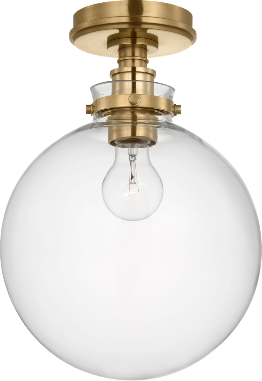 Parkington 10" Globe Flush Mount in Antique-Burnished Brass with Clear Glass