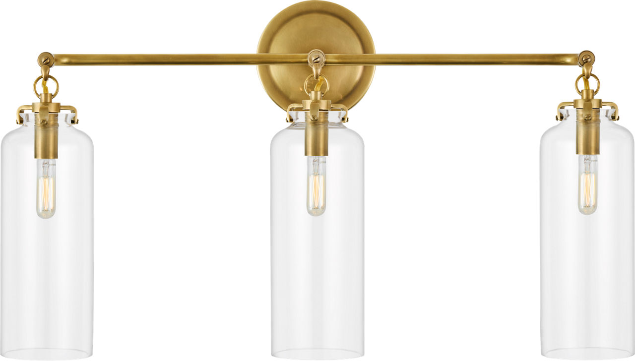 Katie Small Cylinder Triple Sconce in Hand-Rubbed Antique Brass with Clear Glass