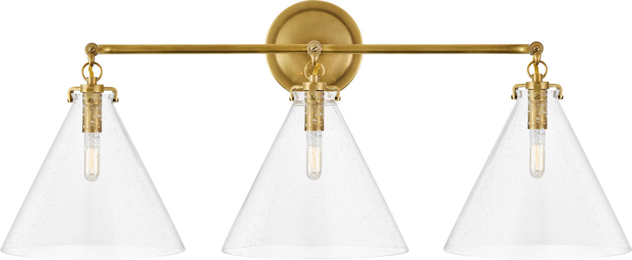 Katie Small Conical Triple Sconce in Hand-Rubbed Antique Brass with Seeded Glass